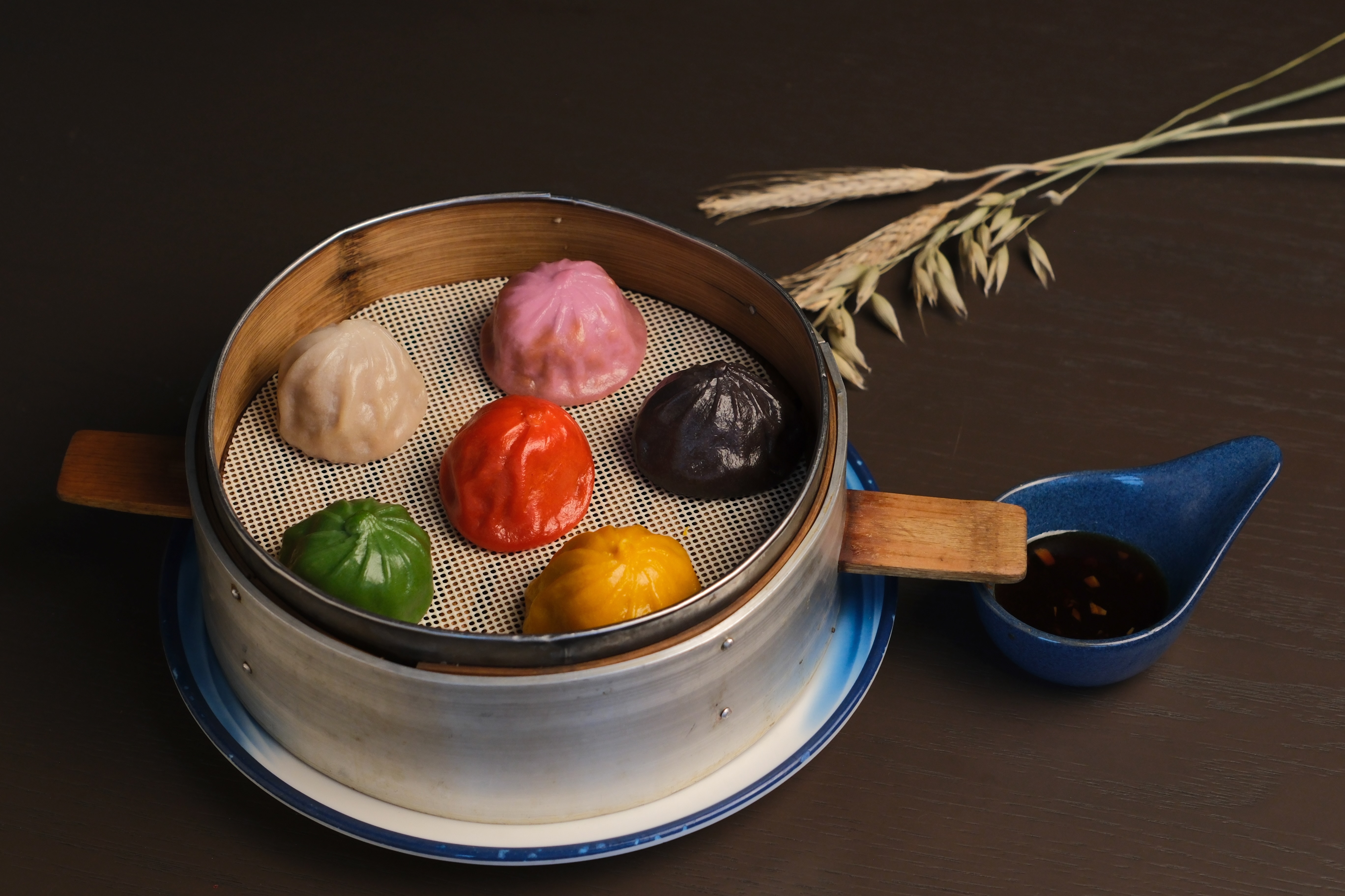 A colorful soup dumpling steamer from YU Noodles